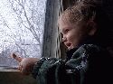 Owen smiling by the window