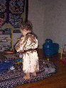 Owen in his robe from behind.